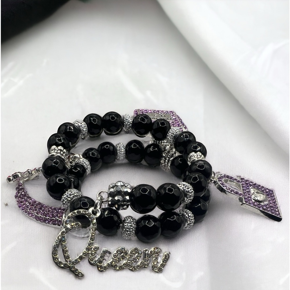 Black onyx beads with sliver and little purple bling memory wire bracelet